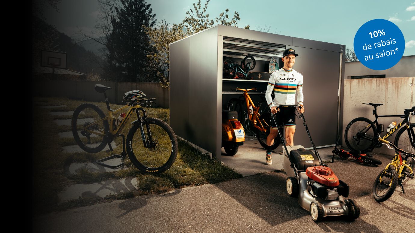 Le champion du monde de VTT Nino Schurter avec des abris à vélos Velopa